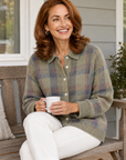Ruby plaid collared cardigan, worn on a porch