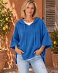 Laurel hooded knit poncho in blue