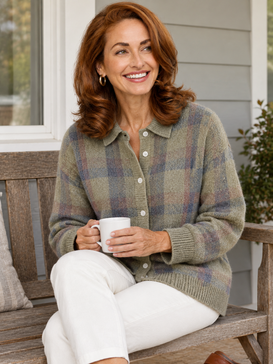 Ruby plaid collared cardigan, worn on a porch