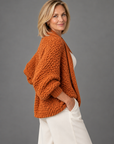 Margot chunky wrap sweater in rust 